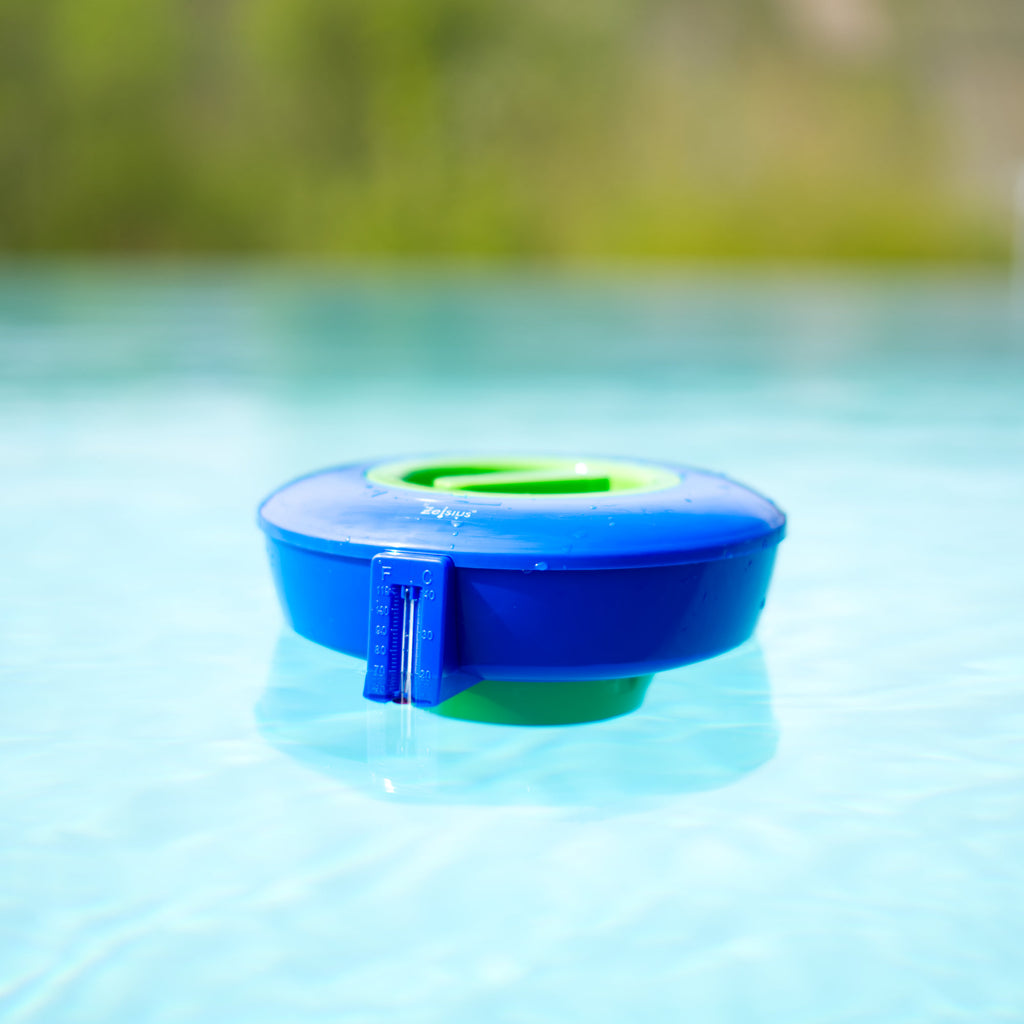 Flotteur doseur de piscine, comprenant thermomètre et distributeur de chlore