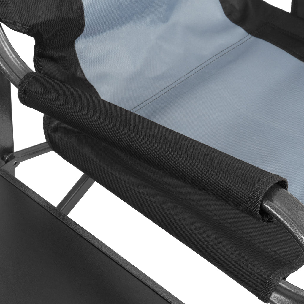 Folding camping chair, including fold-out table