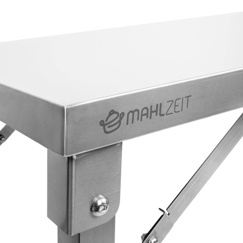 Table en acier inoxydable, système de pliage inclus