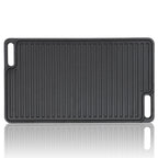 Plaque de cuisson réversible en fonte, pré-culottée, avec poignées et grille.