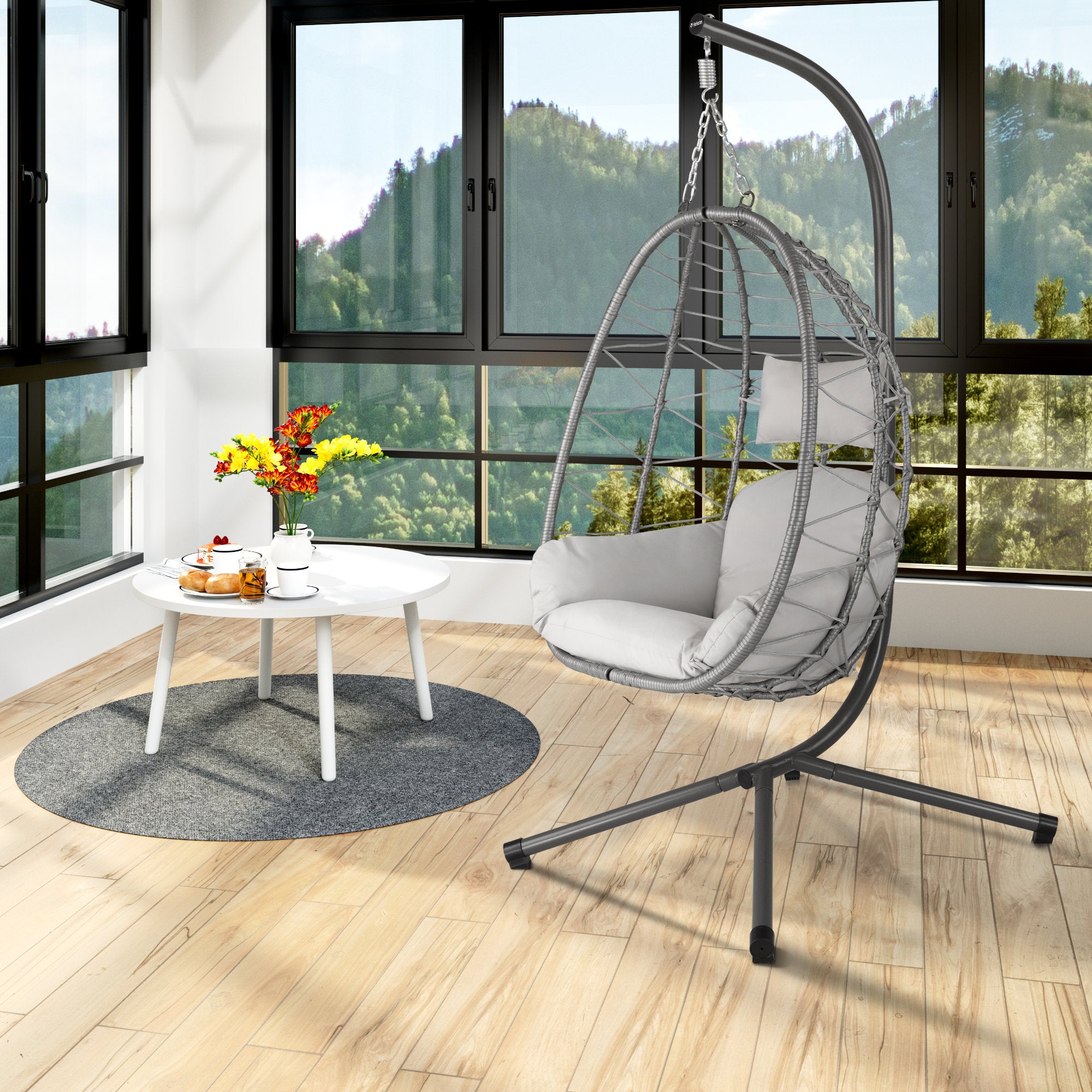 Fauteuil suspendu, assise ronde, structure comprise