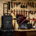 Valise de transport de 18 litres, comprenant un compartiment pour outils et des roues.