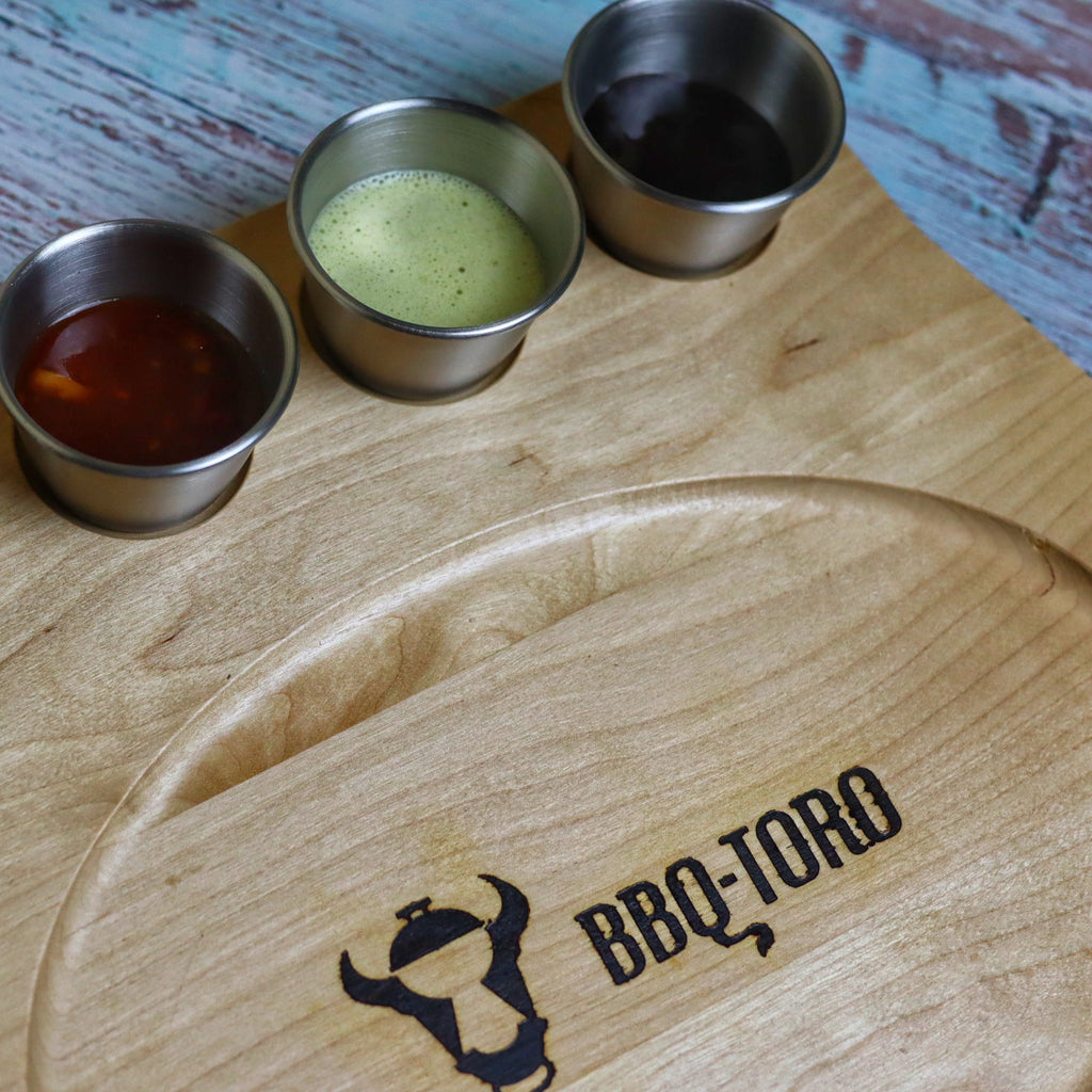 Serving pan, 24 x 17.5 cm, oval, including stainless steel dipping bowls and wooden base.