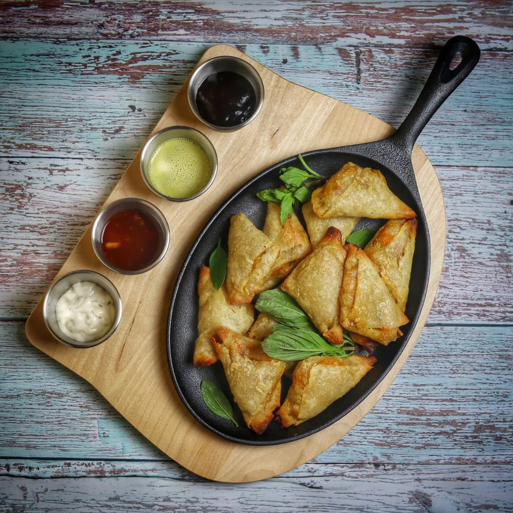Serving pan, 24 x 17.5 cm, oval, including stainless steel dipping bowls and wooden base.