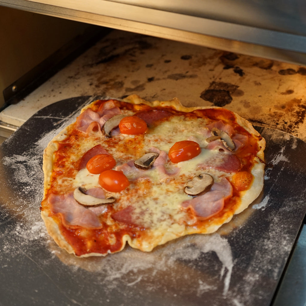 Four à pizza électrique, comprenant une pierre à pizza et une minuterie